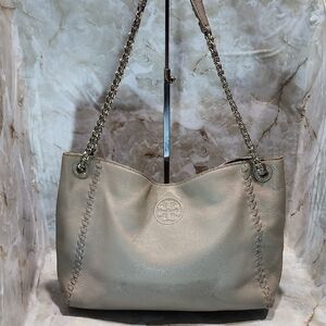 Tory Burch Marion Chain Slouchy Tote in pebbled leather with gold-tone hardware.